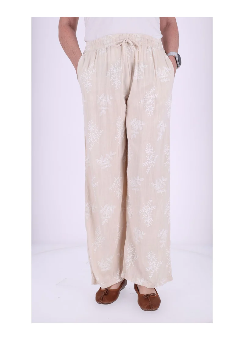 Damen Schlupfhose mit Flockprint – Beige