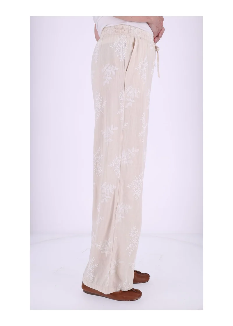 Damen Schlupfhose mit Flockprint – Beige