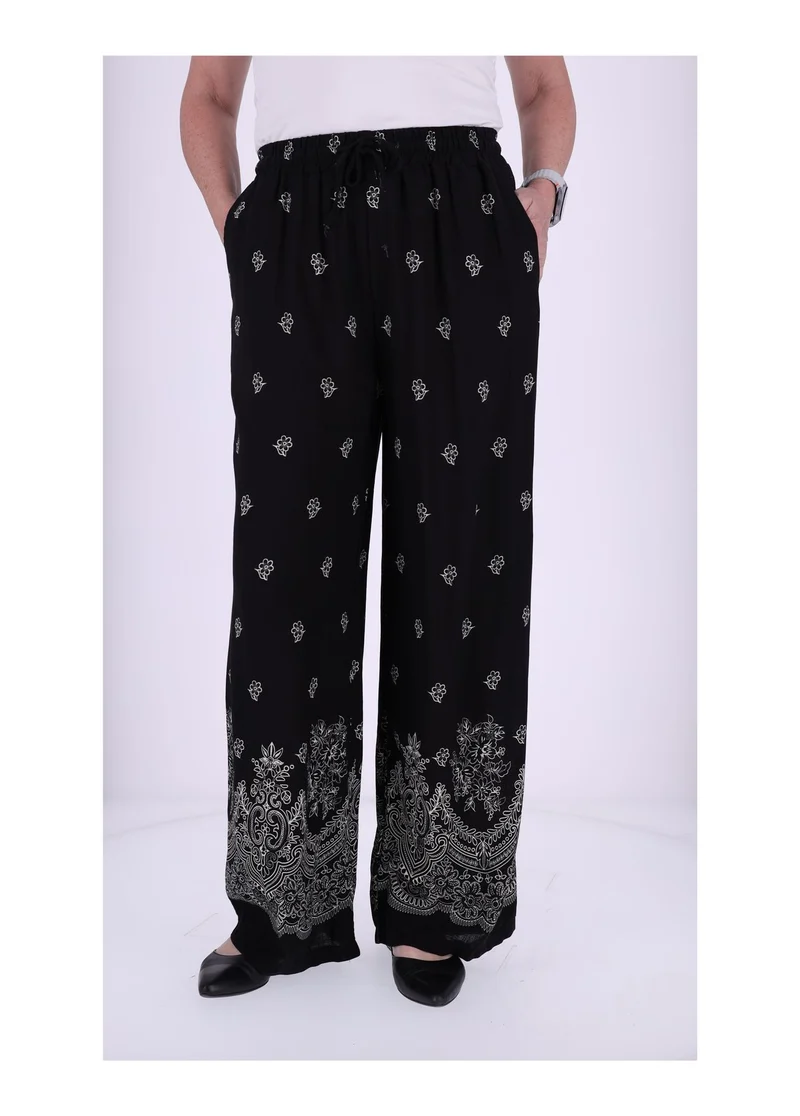 Damen Schlupfhose mit Blumenprint – Schwarz