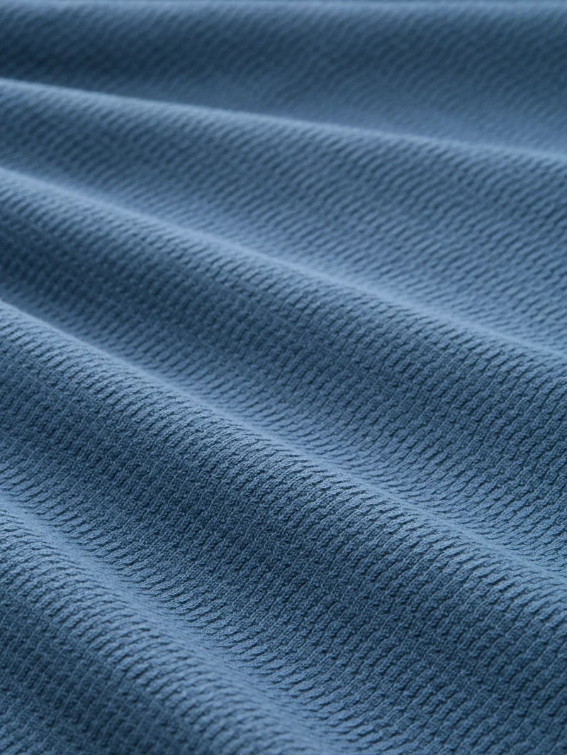 structured roll edge knit, dusty denim blue
