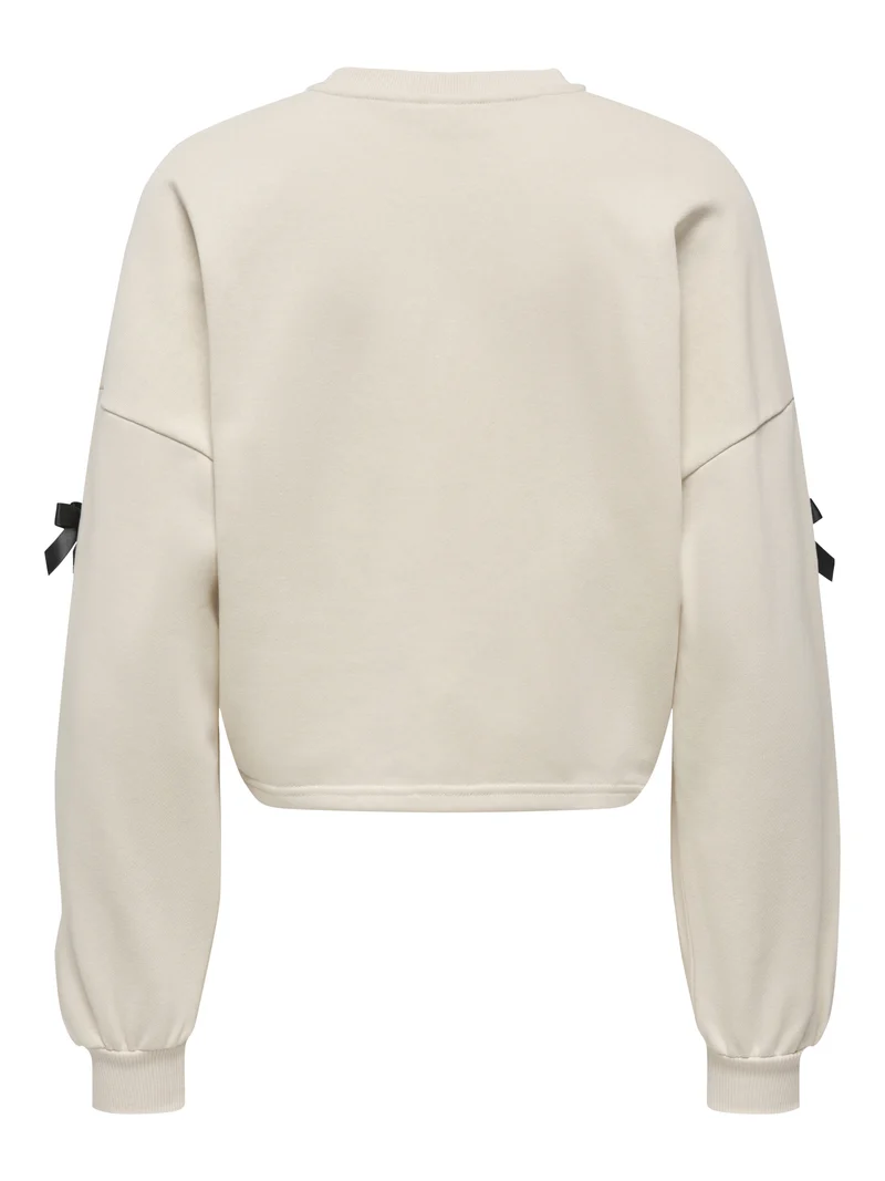 ONLJEDEITE L/S BOW BOX UB SWT, Birch/Black bows