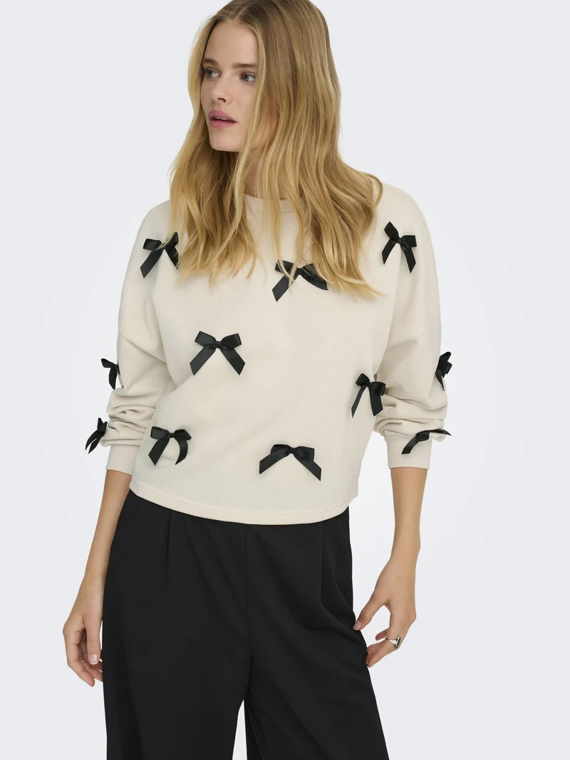 ONLJEDEITE L/S BOW BOX UB SWT, Birch/Black bows