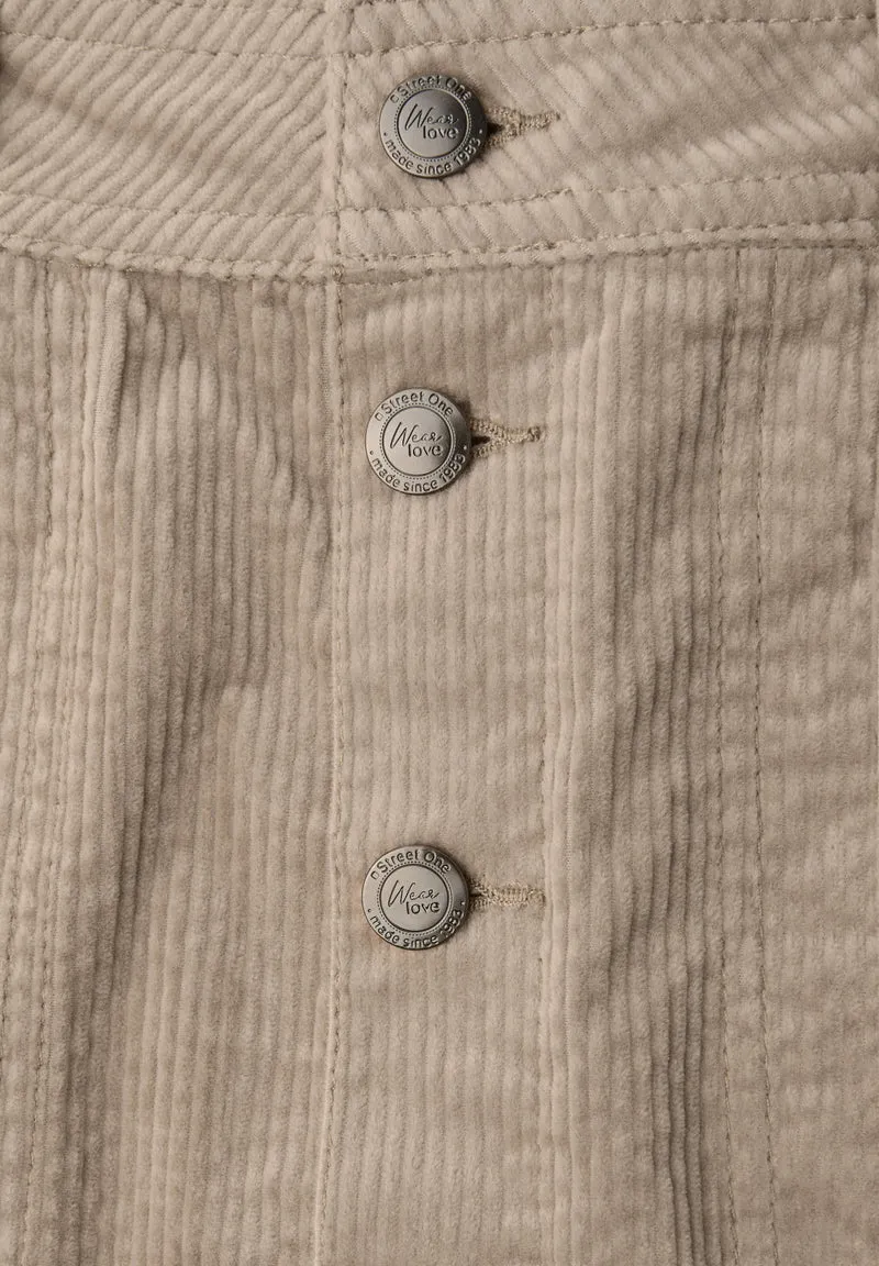 Button through corduroy skirt_, flowing beige