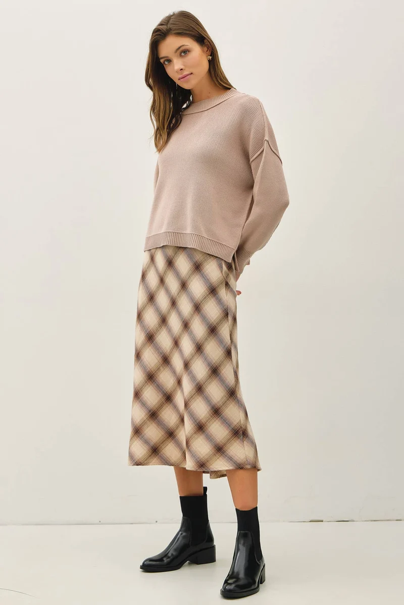 Ribbed knit sweater with raw seam details