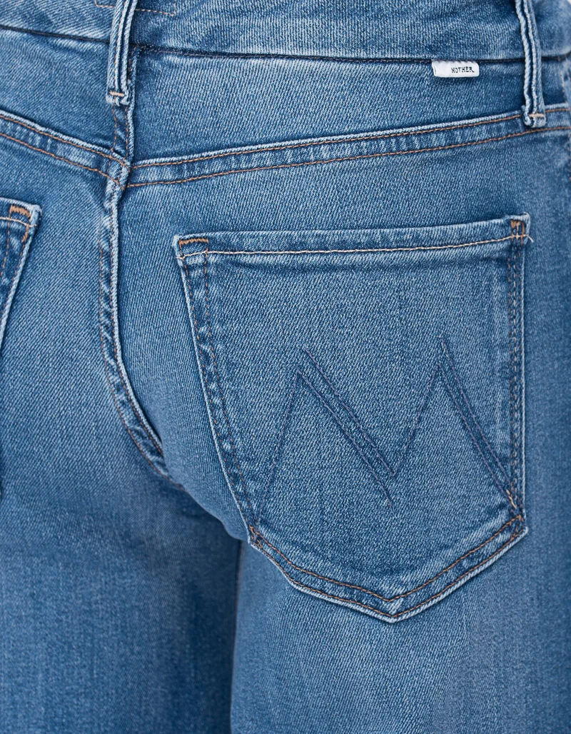 Flare-Leg Jeans mit offenem Saum