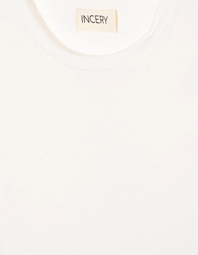 Boxy-Cut Strick T-Shirt