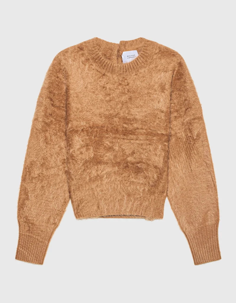 Fuzzy-Kaschmir-Pullover und dekorativen Knöpfen