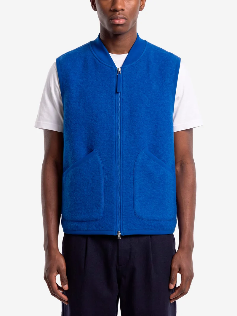 Gilet blu in fleece di lana con zip