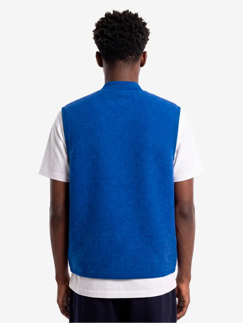 Gilet blu in fleece di lana con zip