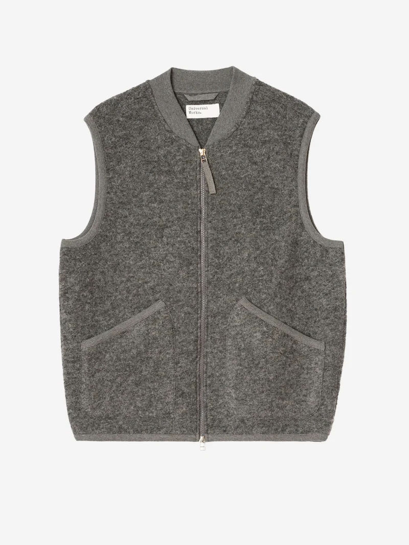 Gilet grigio in fleece di lana con zip