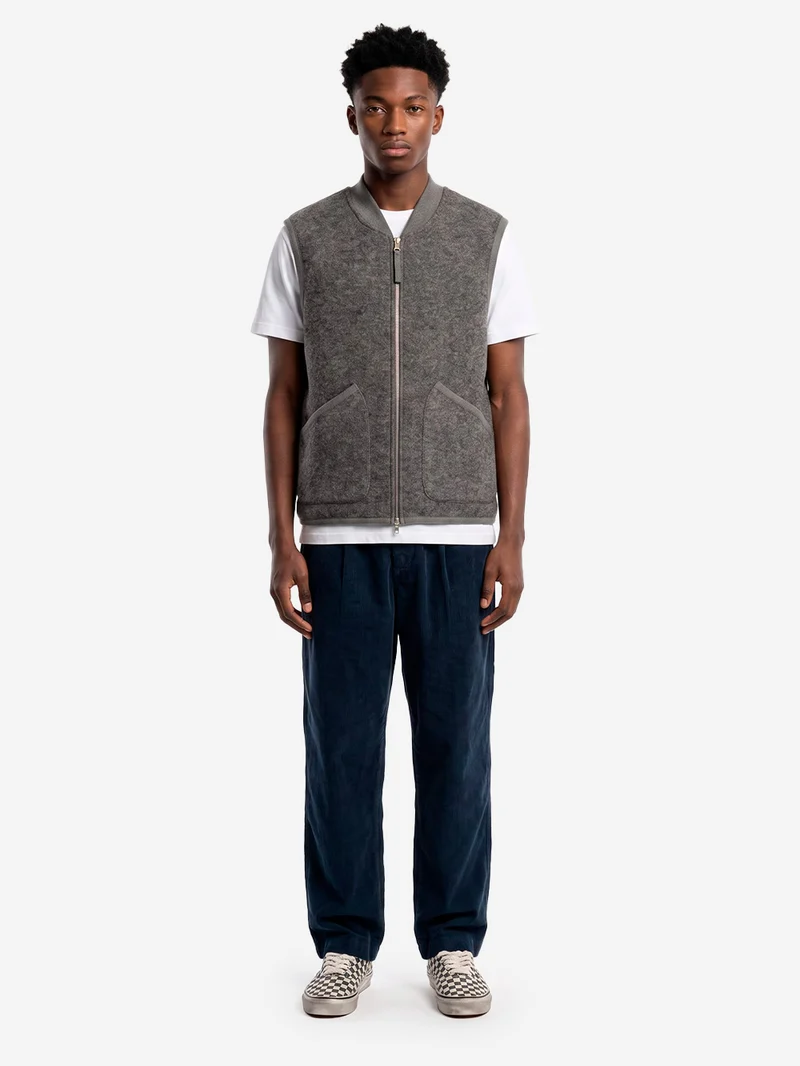 Gilet grigio in fleece di lana con zip