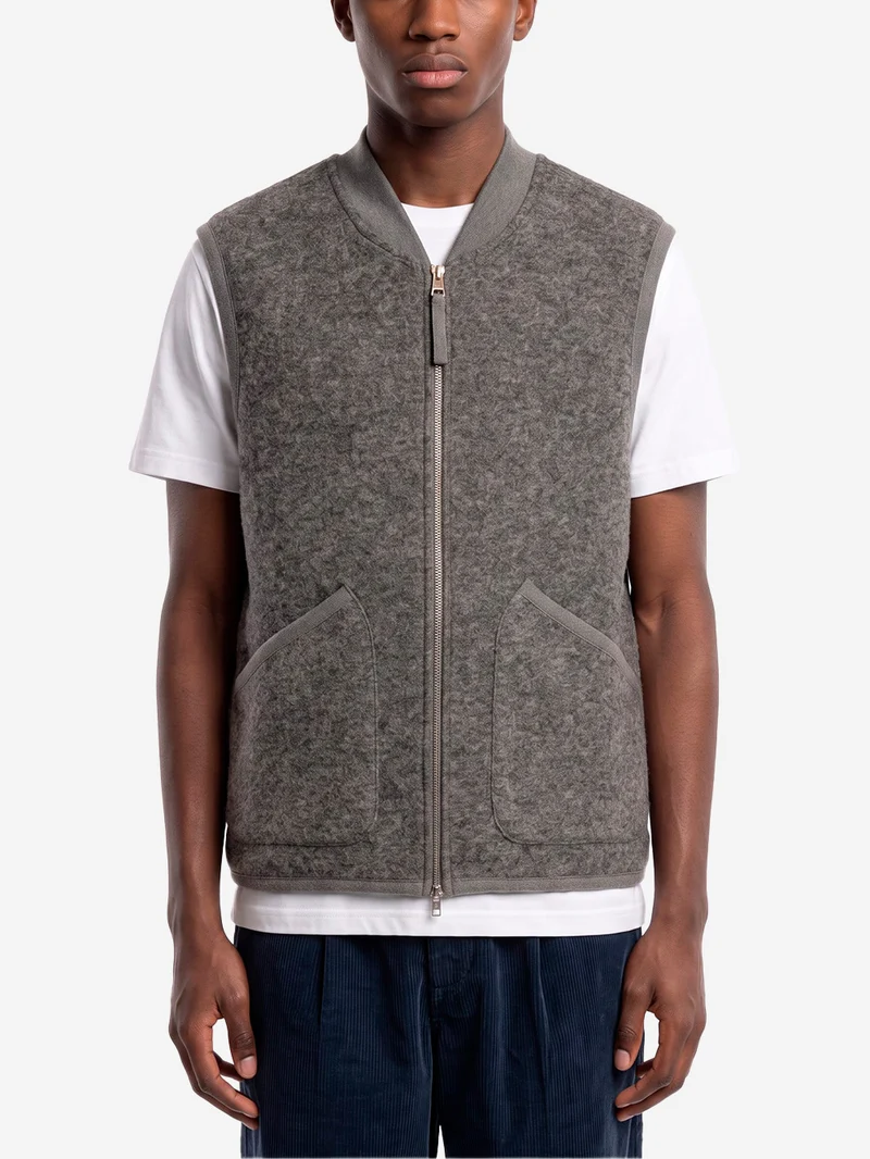 Gilet grigio in fleece di lana con zip