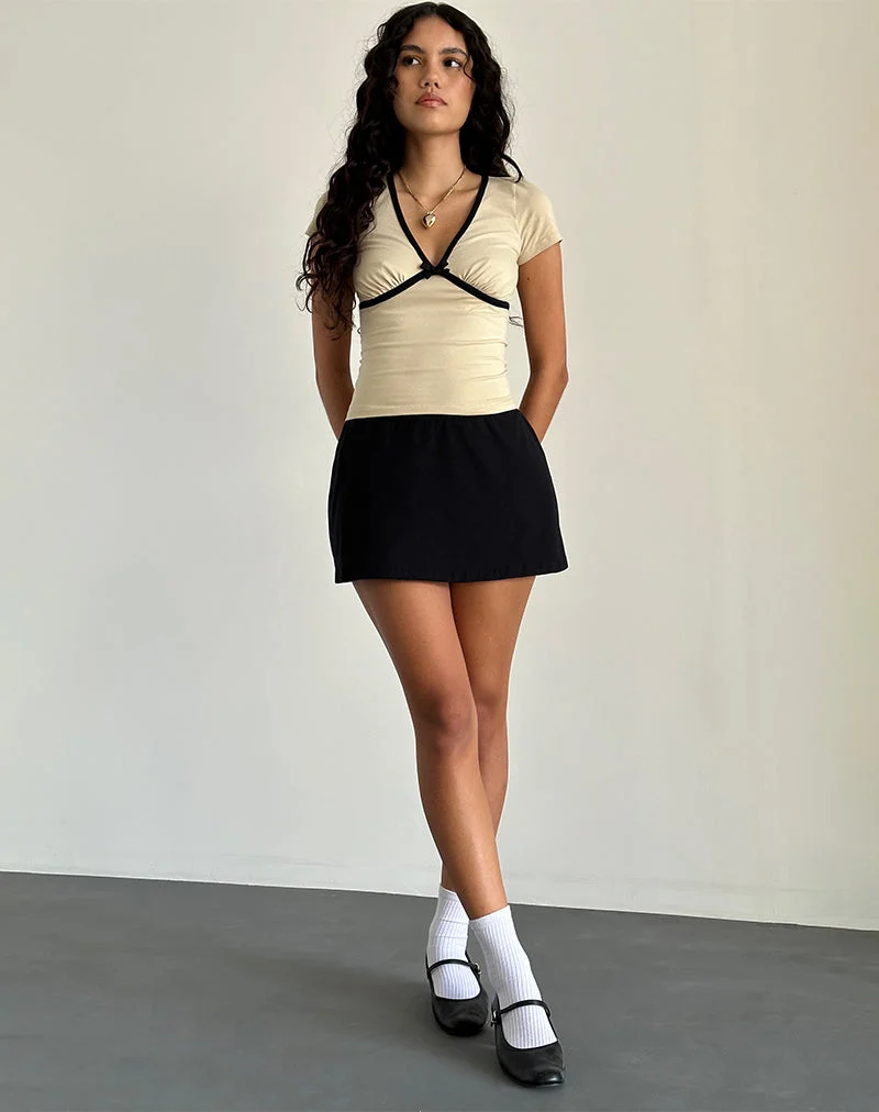Tasina Top in Kokosnussmilch mit schwarzer Bindung