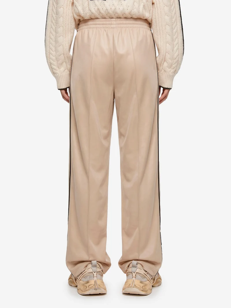 Pantaloni loose 'Firebird' beige con stripes nere