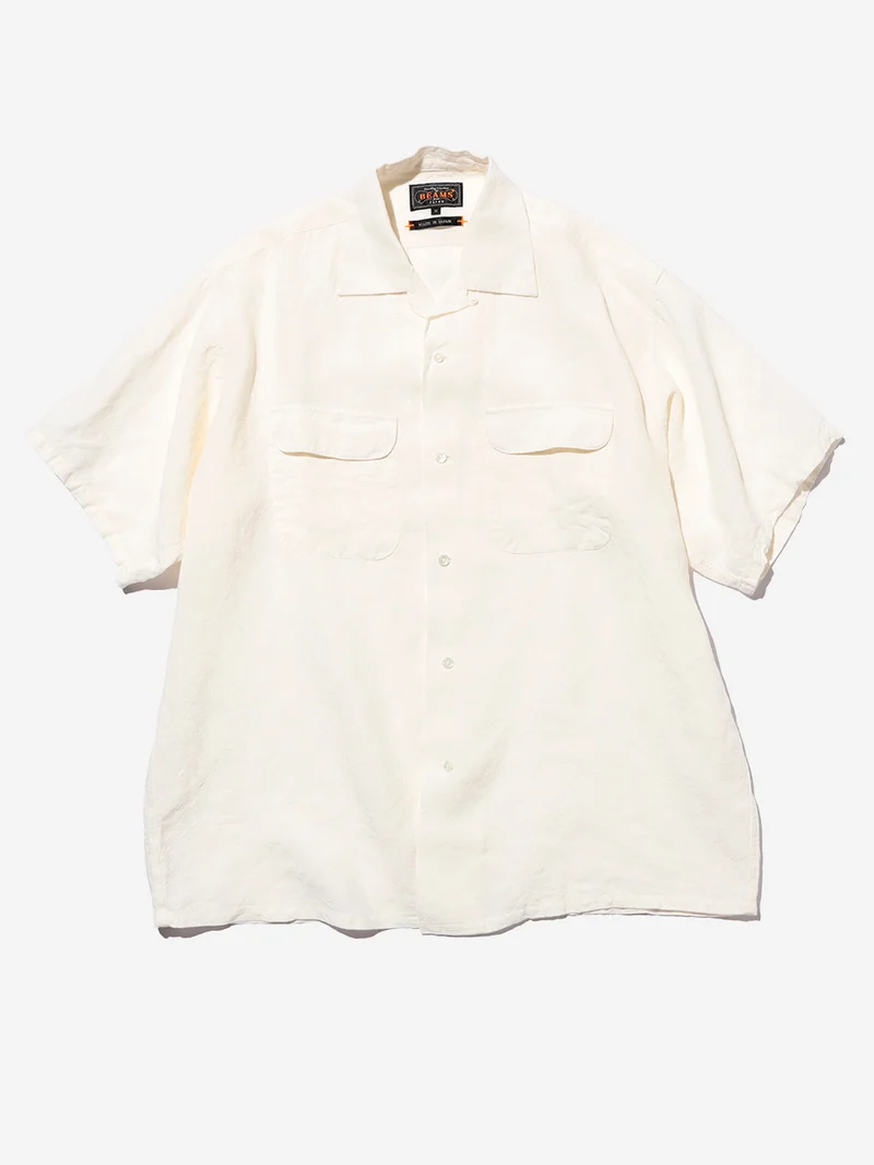 Camicia bianca a manica corta con colletto aperto in lino
