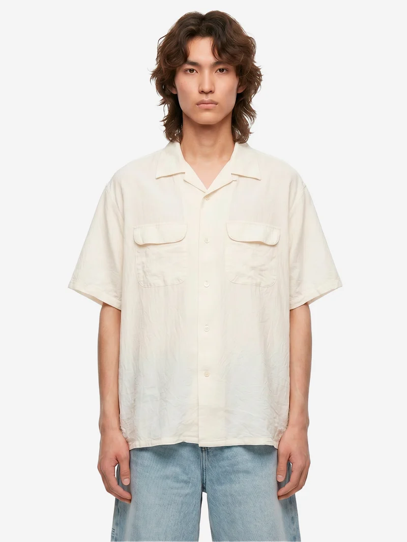 Camicia bianca a manica corta con colletto aperto in lino