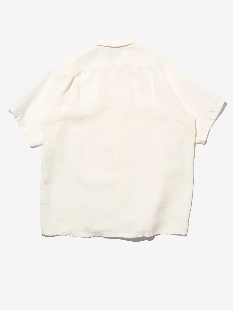 Camicia bianca a manica corta con colletto aperto in lino