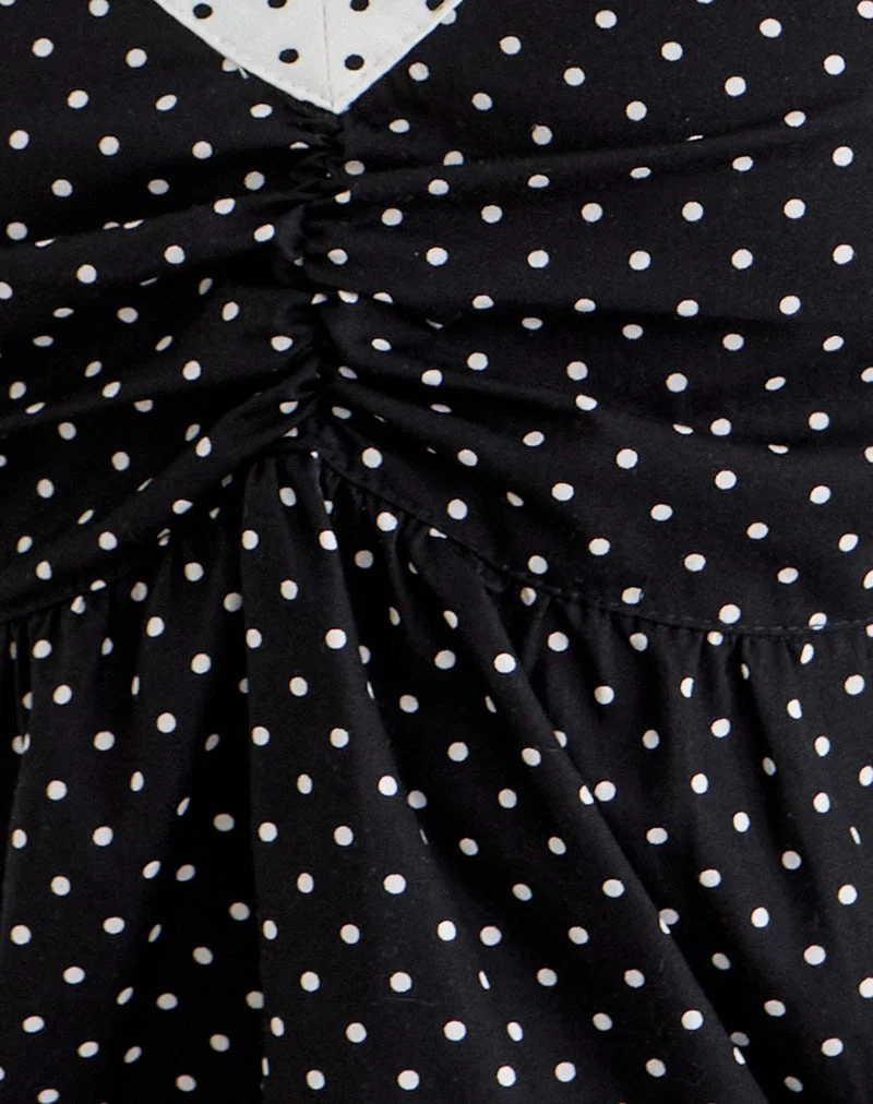Caixi-Top in Schwarz-Weiß-Kombination mit Mikro-Polka-Print