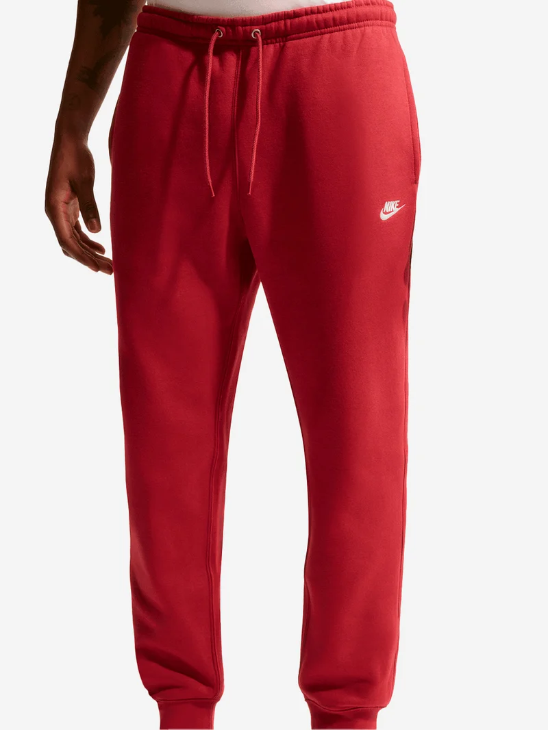 Pantaloni jogger rossi con Swoosh