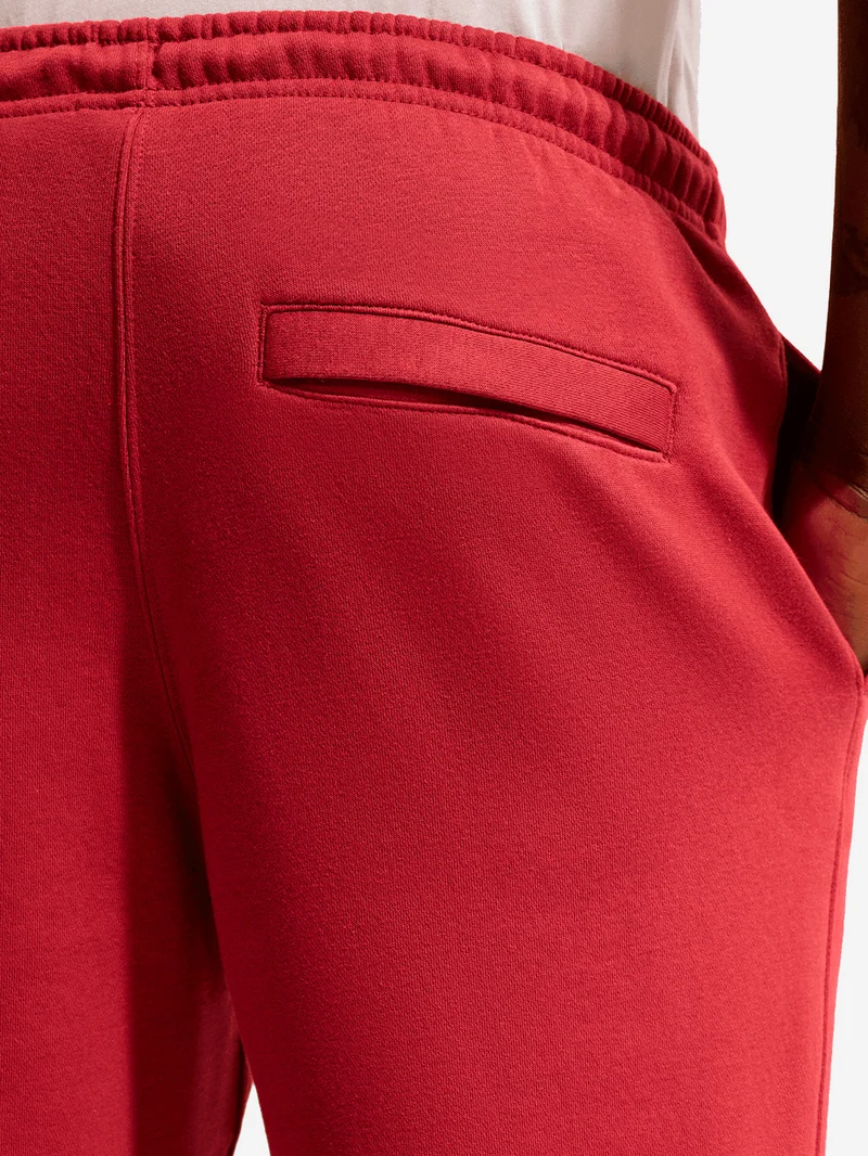 Pantaloni jogger rossi con Swoosh