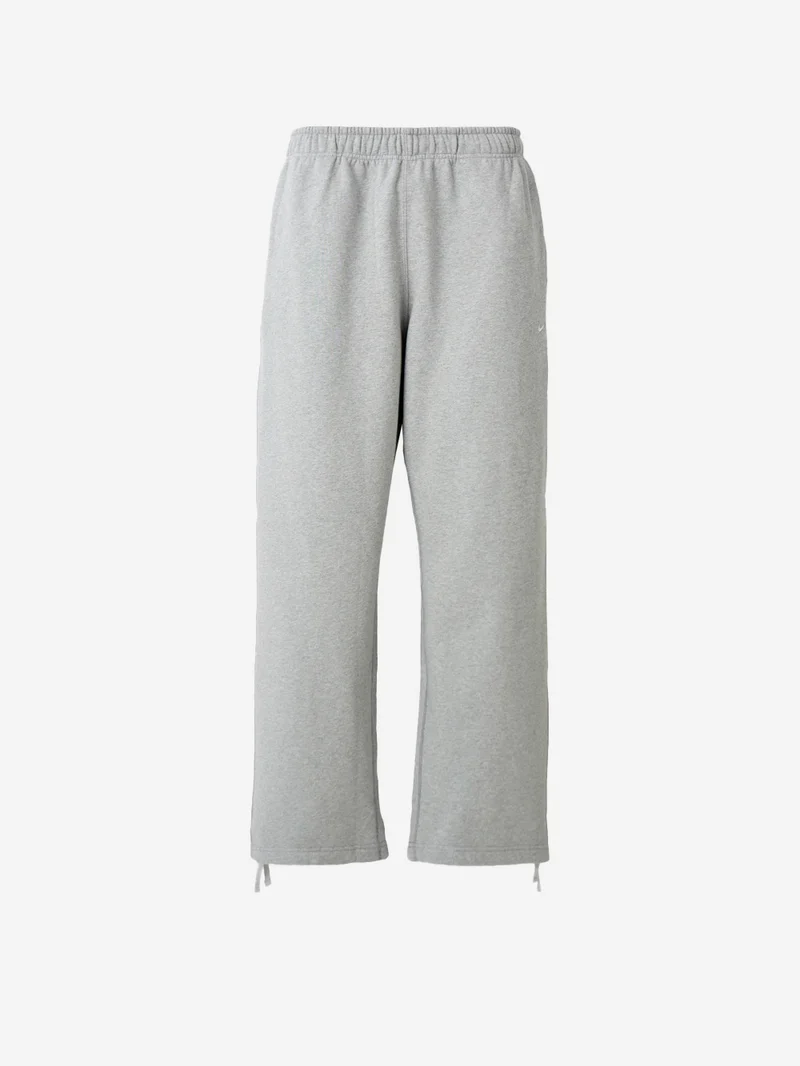 Pantaloni grigi in fleece con orlo aperto