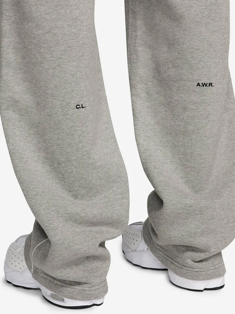 Pantaloni tuta grigi con bordo aperto CS NOCTA x Drake