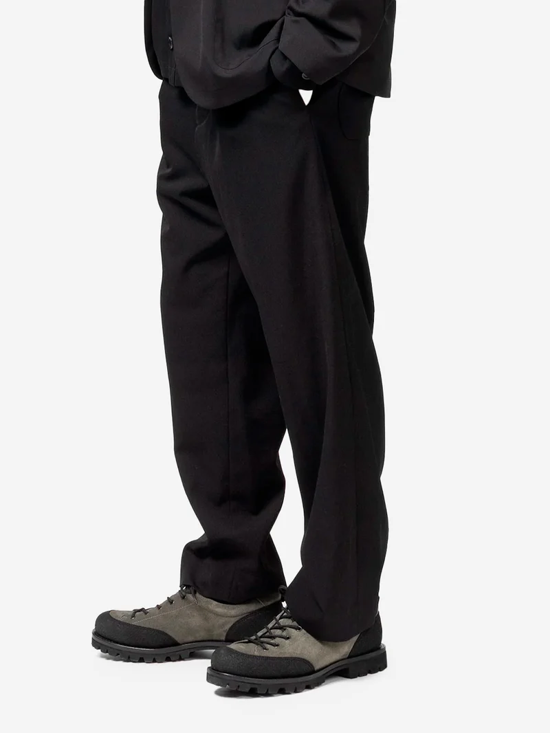 Pantaloni di lana sartoriali relaxed fit con piega