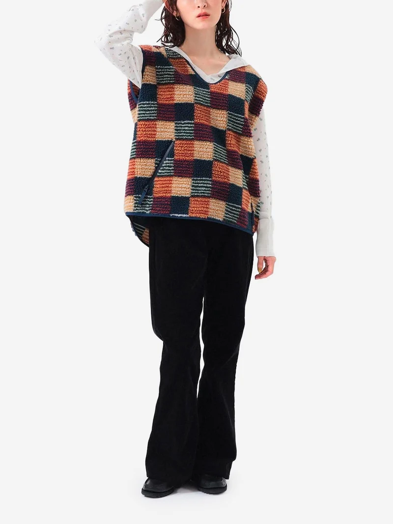 Gilet in pile con jacquard a patchwork