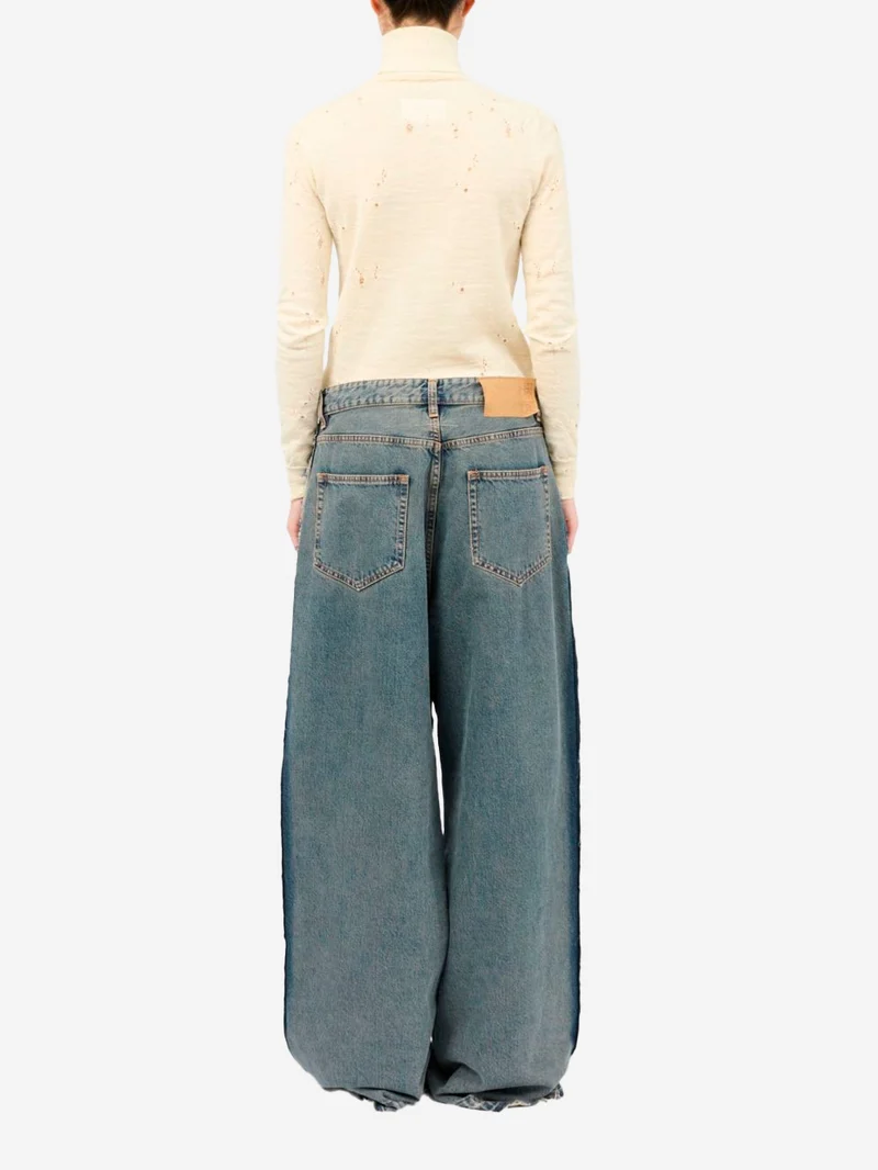 Jeans a gamba larga con cuciture a vista e white stitch